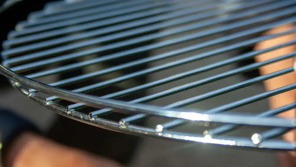 Detailed shot of stainless steel grill construction.